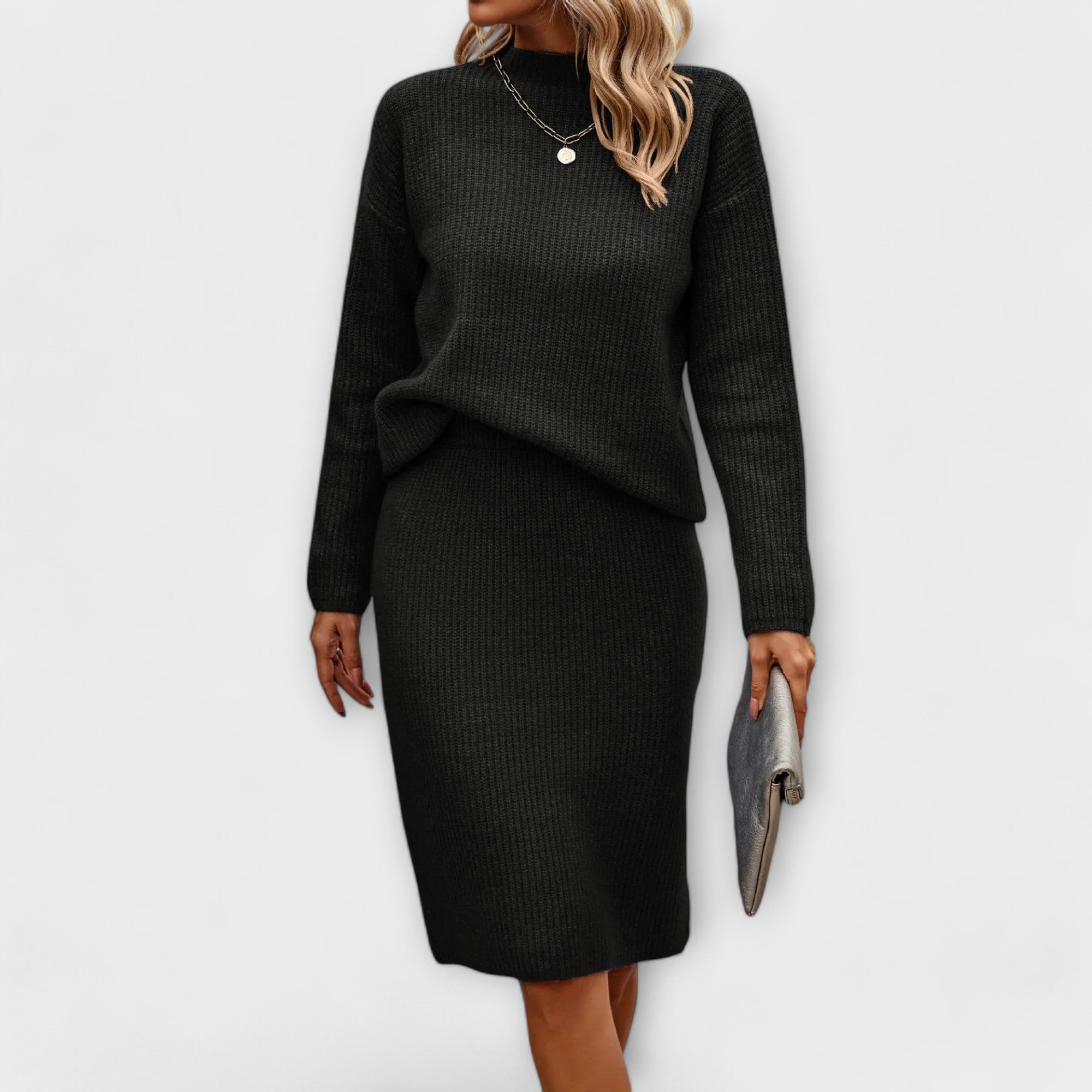 Complete with sweater and two-piece skirt